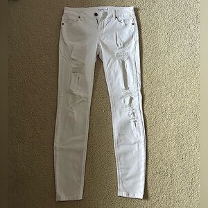 Ripped white denim jeans